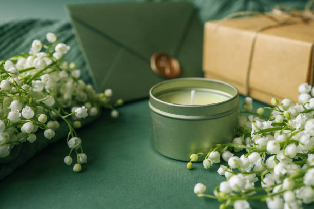Aroma candle in a cozy home spring interior.