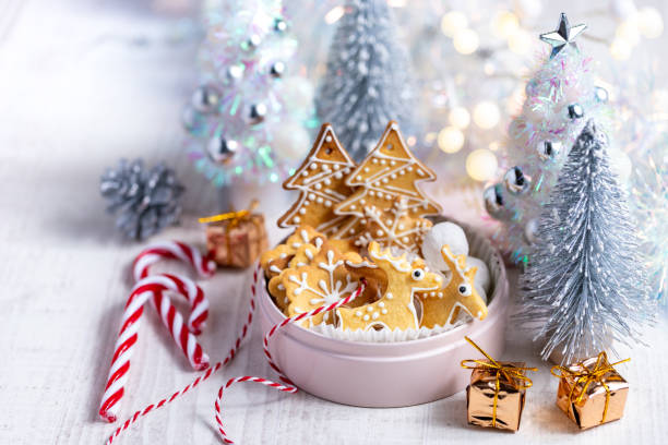 Homemade Christmas cookies on white wooden table